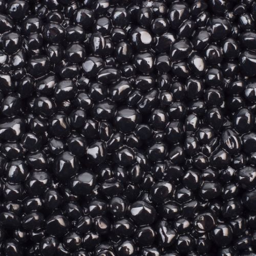 Schwarze Caviar auf dem Bild zu sehen. Das so genennte schwarzes Gold. Jede Cawiar Perle gläntzt einzeln.